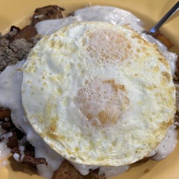 Downtown Diner - Breakfast bowl with seasoned potatoes and eggs over easy. - Breakfast & Brunch Near Me - Titusville, Florida Downtown Diner - Breakfast bowl with seasoned potatoes and eggs over easy. - Breakfast & Brunch Near Me - Titusville, Florida