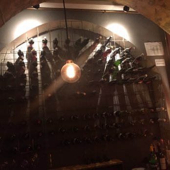 La Maison - Wine rack above the bar - Cocktail Bars Near Me - Barcelona, B