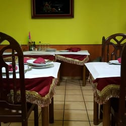 Rajah - Second floor seating.  Too bad the worker was varnishing some chairs so the whole place smelled of paint.