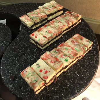 Green's Restaurant - a tray of pizzas on a table - Buffets Near Me - Calgary, Alberta Green's Restaurant - a tray of pizzas on a table - Buffets Near Me - Calgary, Alberta