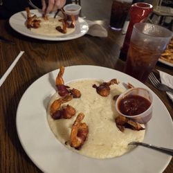 Texas Tea Room - Bacon wrapped shrimp and grits. Delicious!