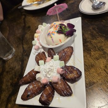 Labios Locos - Fried plantains with some glaze on it, and ice cream on the side (dessert) - Cocktail Bars Near Me - Savage, Minnesota