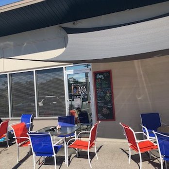 Too Cool Cafe - Too Cool Cafe outdoor seating - New American Near Me - Indian Harbour Beach, Florida Too Cool Cafe - Too Cool Cafe outdoor seating - New American Near Me - Indian Harbour Beach, Florida