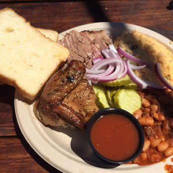 Micklethwait Craft Meats - 2 meat plate with brisket, chicken, beans, and jalapeño-cheddar grits - Food Trucks Near Me - Austin, Texas