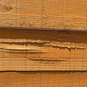 Larry's Fence - One-year-old fence installed by Larry's Fence The lumber was given 2-3 coats of stain on both sides but has split,warped, and rotted since. - Fences & Gates Near Me