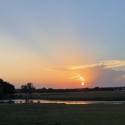 Piguet's Prime Time - Beautiful sunset view from the outdoor seating area!