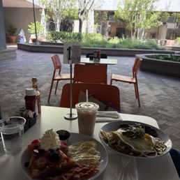 Crossiant Croissant French Toast plate Chilaquiles Verdes With Steak Horchata latte