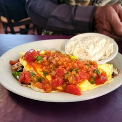 A Touch of Italy Cafe - Shrimp Omelet with grits (homemade salsa on top)
