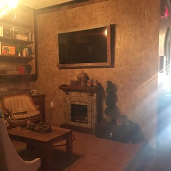 Ella Cafe - In the back, they have a "living room" area with a fireplace - Coffee & Tea Near Me - Plantation, Florida