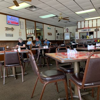 Tasty Home Cookin - a dining area with tables and chairs - American Near Me - Sarasota, Florida