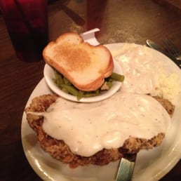 fried chicken with gravy and mashed potatoes