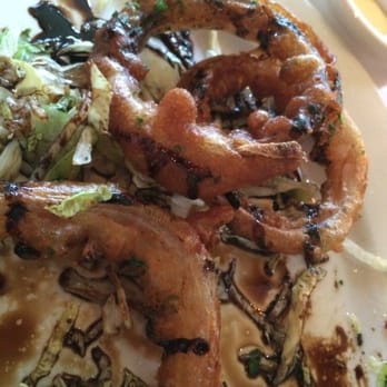 Jane - Firestone red rings [close up, in the middle of being devoured]. - New American Near Me - Santa Barbara, California