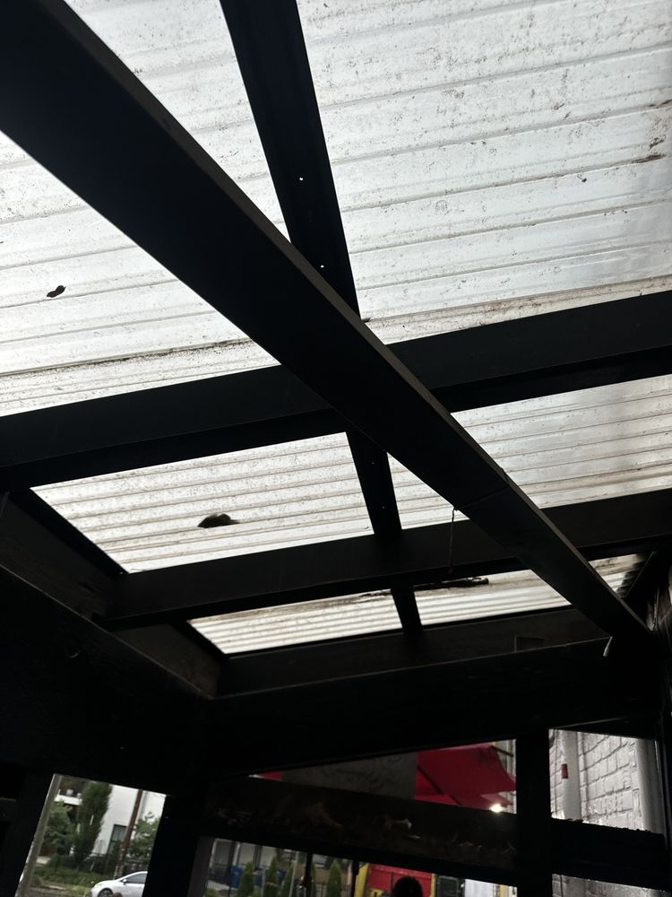 Slide of Mosaic Roofing Company