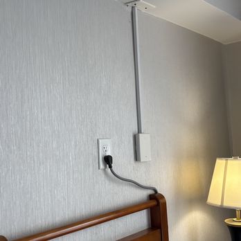 Embassy Suites by Hilton Austin Central - Random plug above bed. - Hotels Near Me - Austin, Texas Embassy Suites by Hilton Austin Central - Random plug above bed. - Hotels Near Me - Austin, Texas