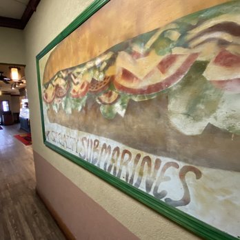 Tony's - a painting of a sandwich on the wall - Pizza Near Me - New Hartford, New York