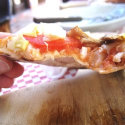 Mezzaluna - Crust possibly 2 mm thick, and still not crisp.