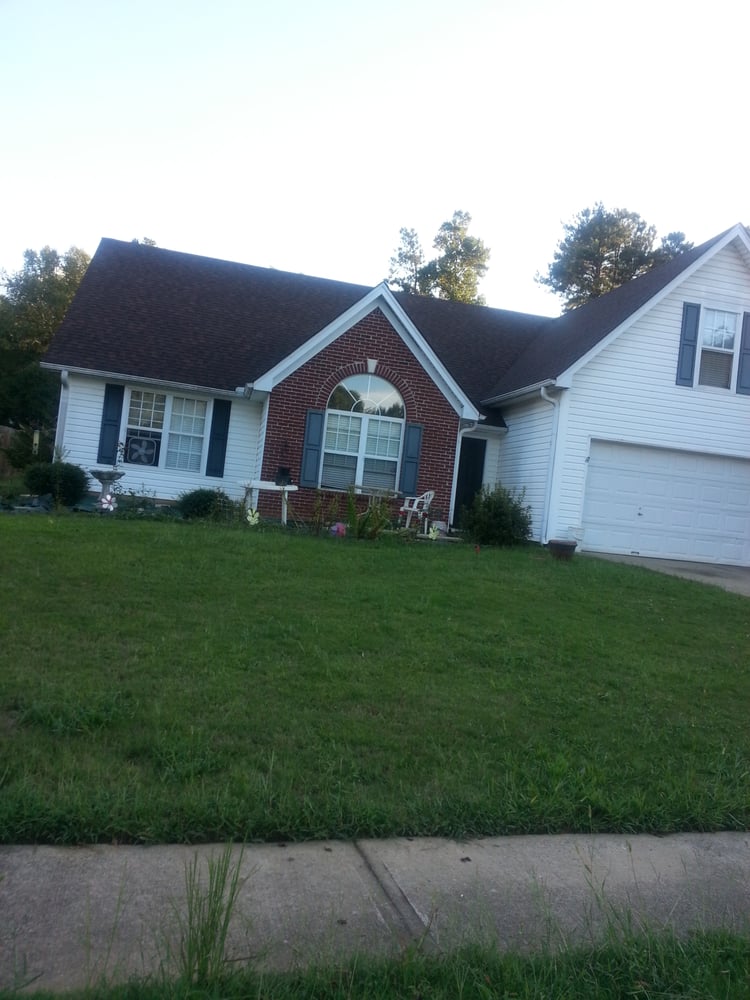 Slide of Manna Roof & Construction