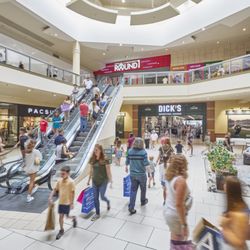 Deptford Mall - Shoppers move between Dick's Sporting Goods and Round1 at Deptford Mall.