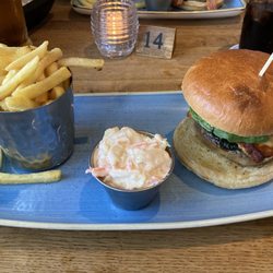 The Ship Inn - Mushroom burger with halloumi and spinach, served with slaw and fries