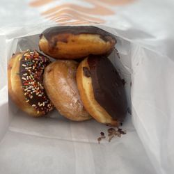 Dunkin' - Donut's put in bag next to each other  without liner papers between - chocolate going everywhere & on donut it's not supposed to be on