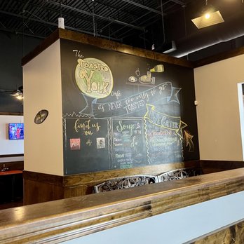 The Toasted Yolk Cafe - Wall at entrance with some info - Breakfast & Brunch Near Me - Houston, Texas The Toasted Yolk Cafe - Wall at entrance with some info - Breakfast & Brunch Near Me - Houston, Texas