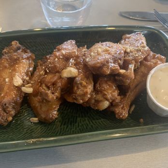 Stones Throw - Chicken wings with Spicy Peanut Sauce. (Gluten-free). - New American Near Me - York, Maine Stones Throw - Chicken wings with Spicy Peanut Sauce. (Gluten-free). - New American Near Me - York, Maine