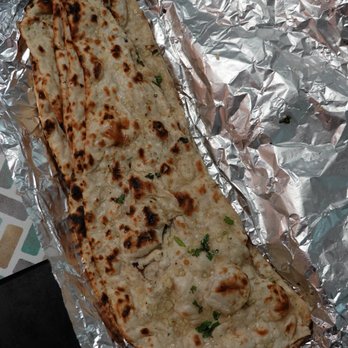 Taj Bistro - $3 - 3 Garlic naans - Indian Near Me - Barrie, Ontario Taj Bistro - $3 - 3 Garlic naans - Indian Near Me - Barrie, Ontario