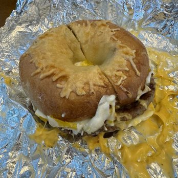 Bagel Bros Cafe - Sausage, Egg, and Cheese on an Asiago Bagel ($8.49) - Breakfast & Brunch Near Me - Clermont, Florida