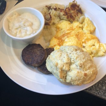 The Trails Eatery - Eggs and sausage patty with home fries, a biscuit, and gravy. - Breakfast & Brunch Near Me - San Diego, California The Trails Eatery - Eggs and sausage patty with home fries, a biscuit, and gravy. - Breakfast & Brunch Near Me - San Diego, California