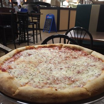 Downtown Oip & Grille - a pizza on a pan - Pizza Near Me - Lewistown, Pennsylvania