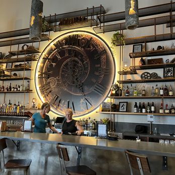 Cordial - a bar with a large clock on the wall - Bowling Near Me - Lake Worth, Florida Cordial - a bar with a large clock on the wall - Bowling Near Me - Lake Worth, Florida