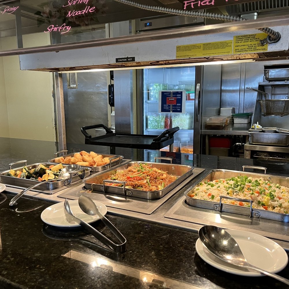 The Buffet - a variety of food items on a counter - Buffets Near Me - Richmond, British Columbia The Buffet - a variety of food items on a counter - Buffets Near Me - Richmond, British Columbia