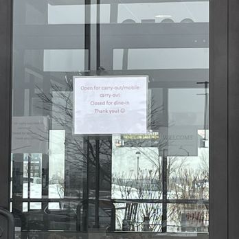 Chick-fil-A - ows a sign in the window - Fast Food Near Me - Dubuque, Iowa