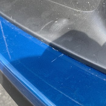 Performance Collision Center - Scratches on new bumper from using ill fitting after market fog light trim. - Body Shops Near Me - Zionsville, Indiana Performance Collision Center - Scratches on new bumper from using ill fitting after market fog light trim. - Body Shops Near Me - Zionsville, Indiana