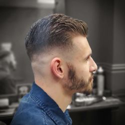 Tony blends - Mid bald fade with styled top
