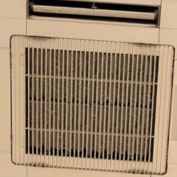 The vent in the room look like it had never been cleaned before.