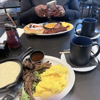Grits and Eggs Breakfast Kitchen - I had the Lamb Chops and Two Sides, wifey had the Two Pancakes and Eggs. - Breakfast & Brunch Near Me - Atlanta, Georgia Grits and Eggs Breakfast Kitchen - I had the Lamb Chops and Two Sides, wifey had the Two Pancakes and Eggs. - Breakfast & Brunch Near Me - Atlanta, Georgia