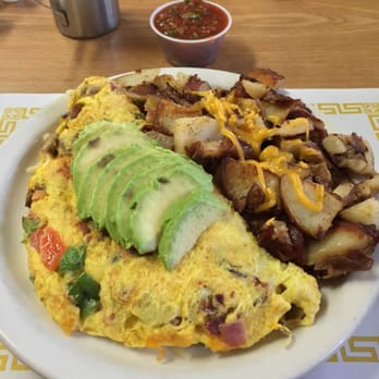 Antique Row Cafe - The works omelette minus the onion with avocato on top and homestyle patatos. - Breakfast & Brunch Near Me - El Cajon, California Antique Row Cafe - The works omelette minus the onion with avocato on top and homestyle patatos. - Breakfast & Brunch Near Me - El Cajon, California