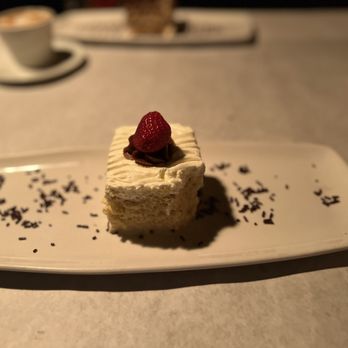 Patagonia Grill & Cafe - a piece of cake on a plate - Argentine Near Me - Houston, Texas