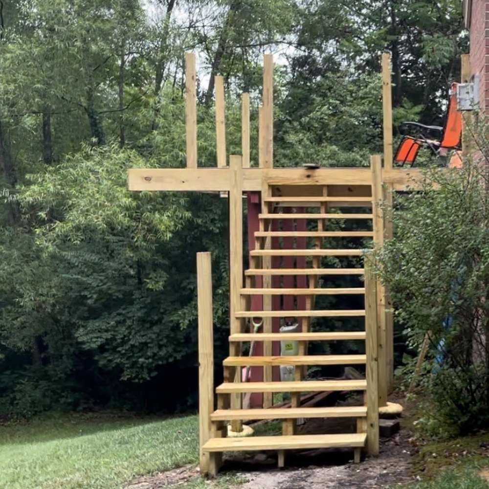 Structure Group - State of construction for over a month. Stringers weren't long enough, so they had to add a patch at the end. Stairs are not level. - Decks & Railing Near Me - Mt. Juliet, Tennessee