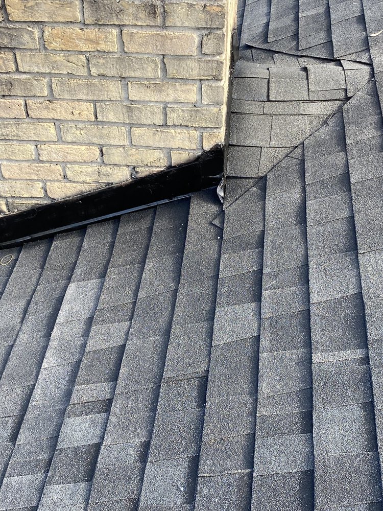 Slide of Y O Roofing