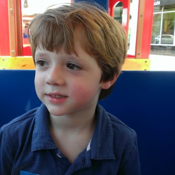The Shops at Wiregrass - Happy boy on the train. - Shopping Centers Near Me - Wesley Chapel, Florida