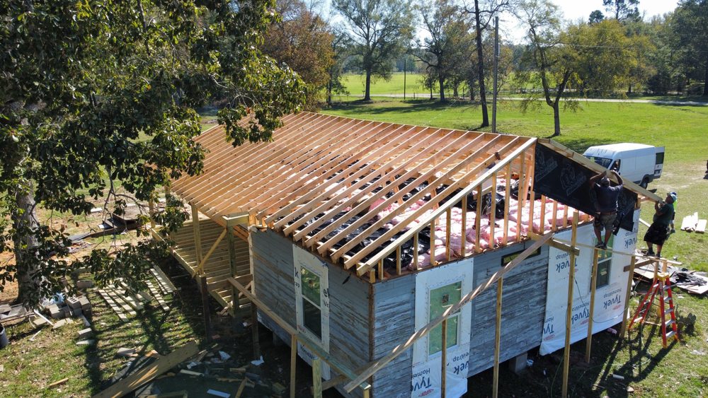 Slide of Lopez Roofing and Construction