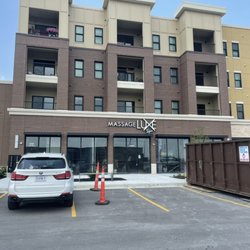 MassageLuXe - Frontal view of our spa location in Streets of West Pryor