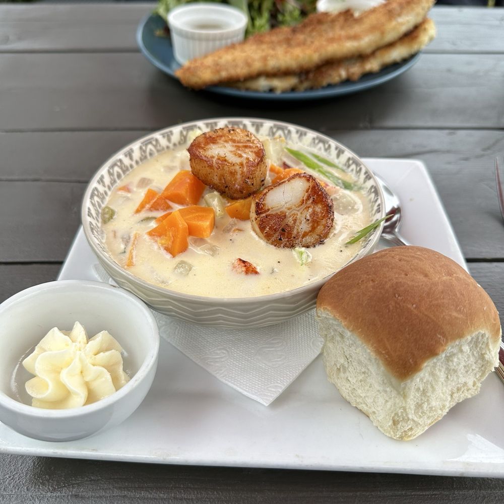 Seafood Chowder. Two scallops on top. Seafood Chowder. Two scallops on top.