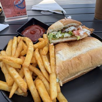 The Cenacle Bistro - Catfish Po' Boy with fries - Coffee & Tea Near Me - Austell, Georgia