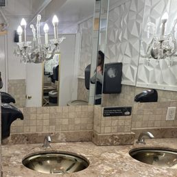 Cute chandelier in the bathroom