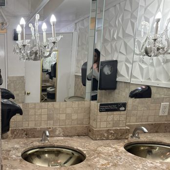 Upper Kirby Bistro - Cute chandelier in the bathroom - New American Near Me - Houston, Texas