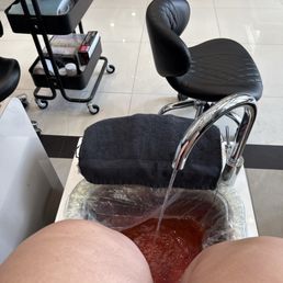 Getting a pedicure Getting a pedicure