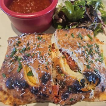 North Italia - Hot Italian stromboli -- minus the 2 end pieces we already ate! - Italian Near Me - Tempe, Arizona North Italia - Hot Italian stromboli -- minus the 2 end pieces we already ate! - Italian Near Me - Tempe, Arizona
